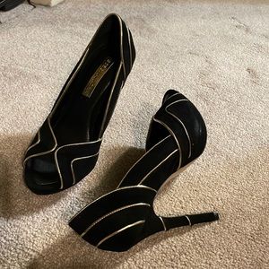 BCBGMaxazria Linden black suede heels with gold trim. Size 5.5.